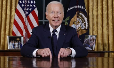 Biden sat at his desk talking to the camera.