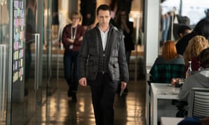 Kendall Roy walking down corridor