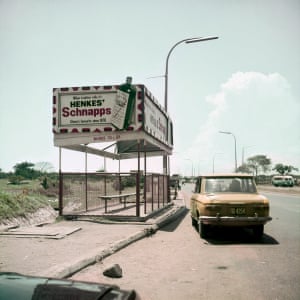 A taxi at a bus stop on Ring Road, Accra, 1974
