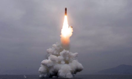The North Korean government issued a photo of what it said was an underwater-launched ballistic missile.