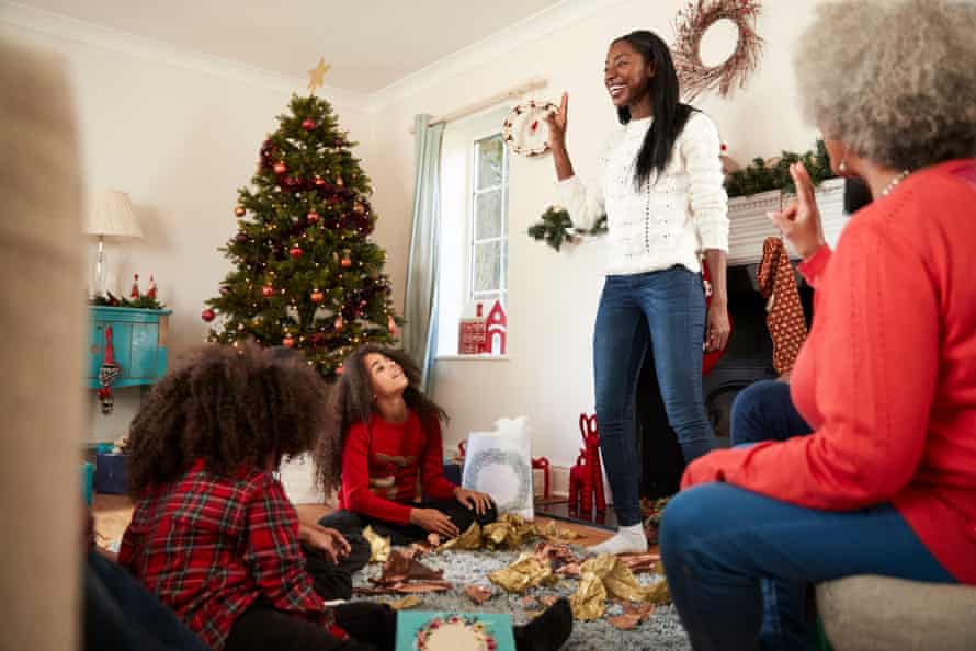Your niece is suddenly vegan! How to survive the 12 disasters of Christmas | Christmas 6 Multi Generation Family Playing Game Of Charades As They Celebrate Christmas At Home TogetherRBNJ9X Multi Generation Family Playing Game Of Charades As They Celebrate Christmas At Home Together