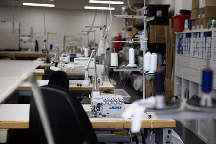 Empty sewing stations at The Fashion Production Company.