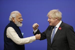India’s prime minister, Narendra Modi, and Johnson exchange greetings