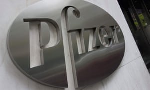 Covid: UK records 44,932 new cases and 145 deaths; US set to partly lift travel restrictions – as it happened 9 Pfizer company logo at Pfizers headquarters in New York.