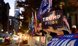 A supporter of Donald Trump holds a sign during a rally in Philadelphia, Pennsylvania.