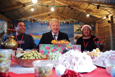 Boris Johnson visits a Christmas market in Salisbury.