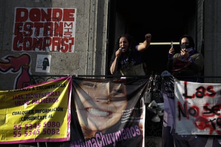 Activist Yesenia Zamudio, whose teenage daughter was killed in a suspected femicide, speaks as demonstrators occupy the human rights commission building in Mexico City on 14 September.