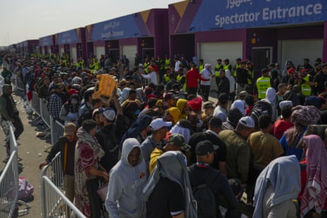 Fans queue outside of the Al Janoub Stadium in Wakrah, Qatar in the hope of getting tickets.