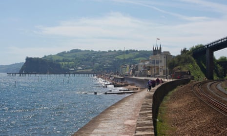 Teignmouth’s pretty seafront with Brunel’s famous Riviera railway to the right