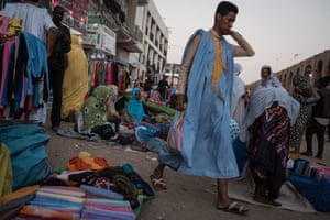 Haratine women sell fabric in the main market in the centre of Nouakchott