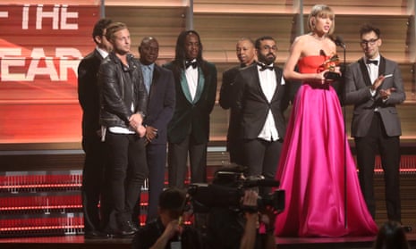 Taylor Swift accepts her album of the year award at the Grammys with the songwriters and producers she worked with ... all of whom are male. 