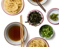 Felicity Cloake's zaru soba. Overhead view of zaru soba noodles served with dipping sauce, seaweed, wasabi and spring onions