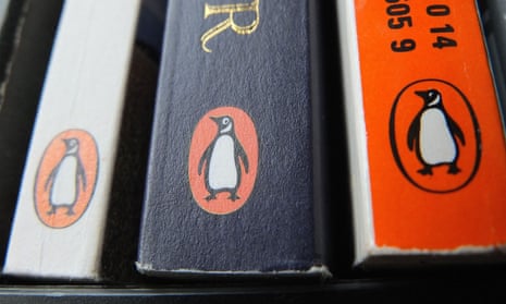 The Penguin logo on the spines of books on a shelf.