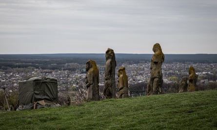 Medieval sculptures known as babas stand on Mount Kremenets overlooking Izium in Ukraine’s Kharkiv region. One was damaged during Russia’s occupation of the area in 2022. Marushchak has since arranged the removal and safe storage of these and many similar sculptures across eastern and southern Ukraine.