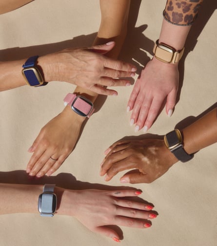 Five hands and wrists of women wearing the bracelet in different shades