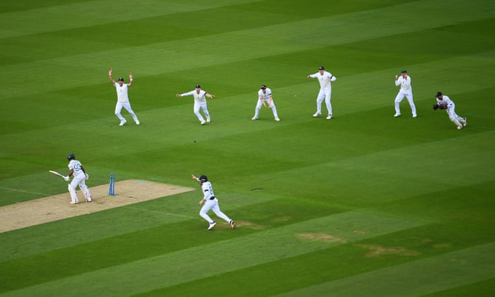 England celebrate the wicket of Keegan Petersen of South Africa bowled by Ollie Robinson.