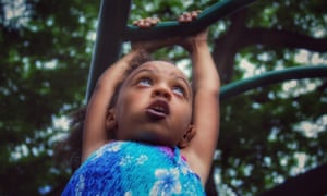 Girl on climbing frame