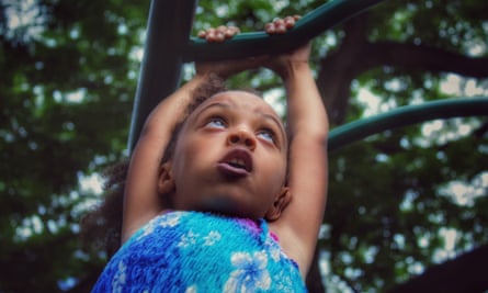 Girl on climbing frame