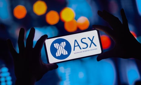  In this photo illustration, the Australian Stock Exchange (ASX) logo seen displayed on a smartphone. 