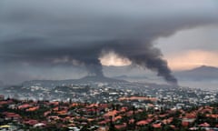 Smoke rises during riots in Noumea, New Caledonia, Wednesday 15 May 2024
