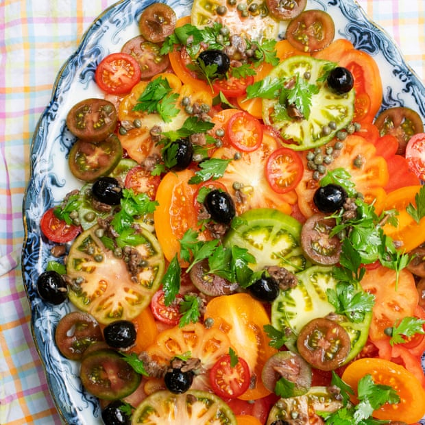 Tomato salad with olives and anchovies.