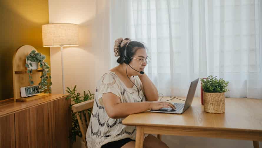 Transgender female working from home.Posed by model Transgender female have a meeting at home and work remotely for quarantine, working from home concept.