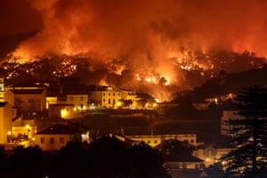 Houses in Monchique are surrounded by wildfires