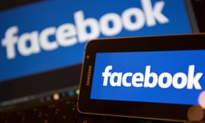 Facebook logos on phone and computer screen