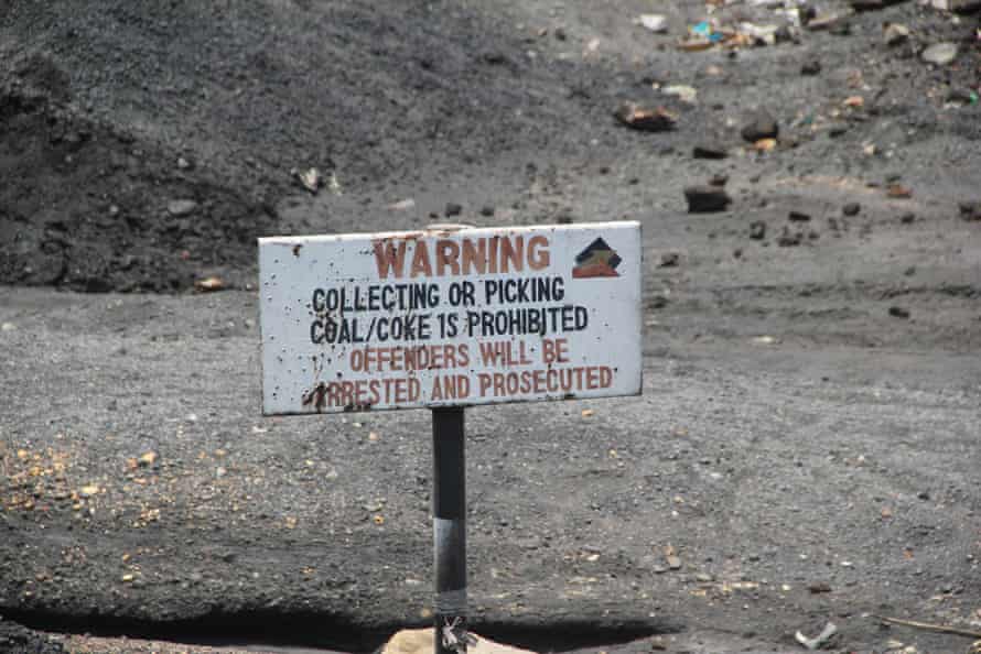A sign warning against coal collecting at Hwange colliery.