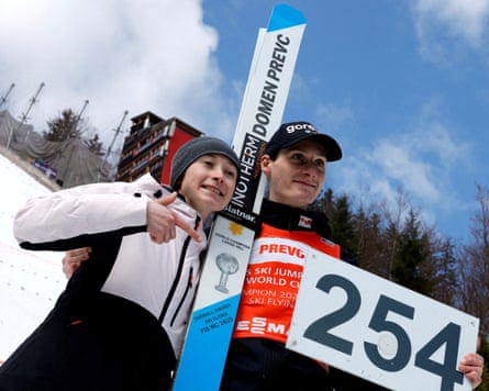 Domen Prevc poses with his sister Nika Prevc after setting a new world record in the men’s individual HS240