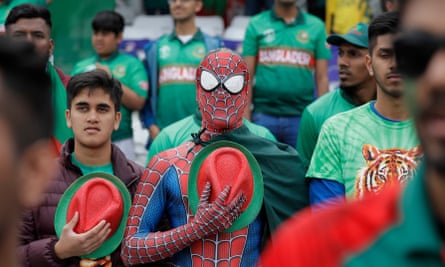 Bangladesh fans stand during their national anthem before the match against Australia at Trent Bridge.