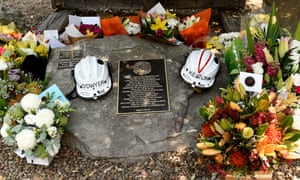The helmets of volunteer firefighters Andrew O’Dwyer and Geoffrey Keaton at a memorial at the Horsley Park Rural Fire Brigade. They were in a truck convoy near the town of Buxton when a tree fell into their path, prompting the vehicle to roll off the road, with both men dying at the scene.