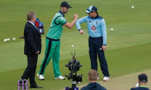 The two captains greet each other for the toss.