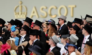 Racegoers watching ... the racing.