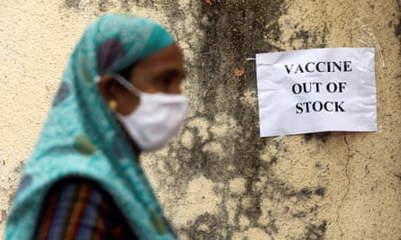 A notice about the shortage of coronavirus vaccine supplies is seen at a vaccination centre, in Mumbai.