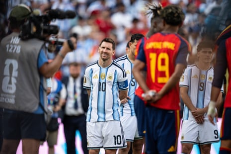 Messi watches the ceremonial proceedings unfold after the match.
