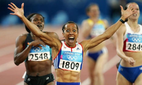 Dame Kelly Holmes crosses the finish line to win 800m gold in Athens.