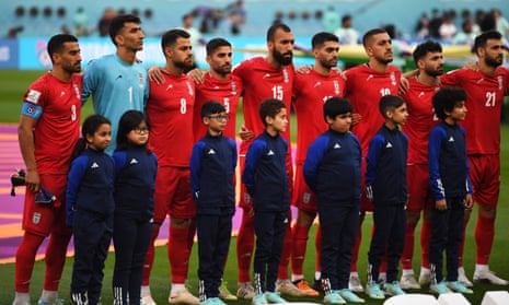 Iran players stand during their national anthem before their Fifa World Cup 2022 match against England.