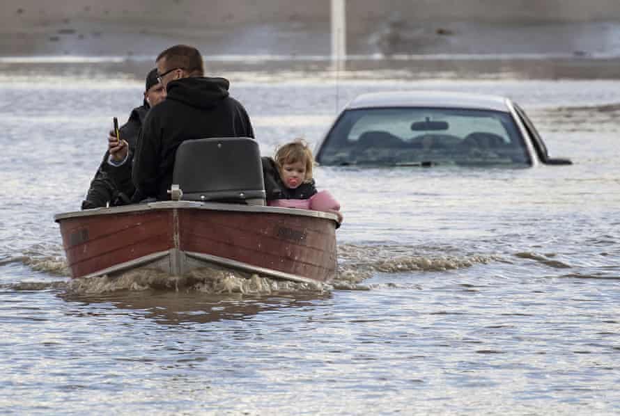 TravelGuides - Canada confirms fatalities from floods and landslides after Pacific north-west storm | Canada 3 A volunteer uses a boat to rescue people, including a toddler, who were stranded in Abbotsford, British Columbia.