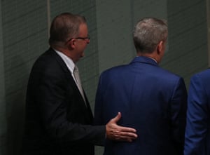 He’s behind you: Anthony Albanese congratulates Bill Shorten after he delivered his budget reply last week.