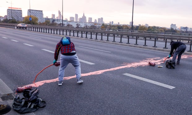 Protesters spill red paint on the Łazieńkowski Bridge