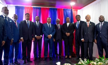 FILES-HAITI-POLITICS-TRANSITION<br>(FILES) The members of the new Haitian transitional council pose after being sworn in at the National Palace in Port-au-Price, Haiti, on April 25, 2024. A long-awaited transitional ruling council was sworn in in crisis-torn Haiti Thursday, an official told AFP, the first step to forming a new government after months of gang violence in the Caribbean nation. (Photo by Clarens SIFFROY / AFP) (Photo by CLARENS SIFFROY/AFP via Getty Images)