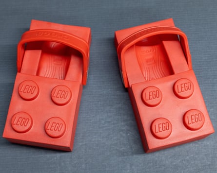 Pair of Lego Crocs in the shape of a Lego brick