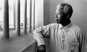 Nelson Mandela in his former cell at Robben Island.