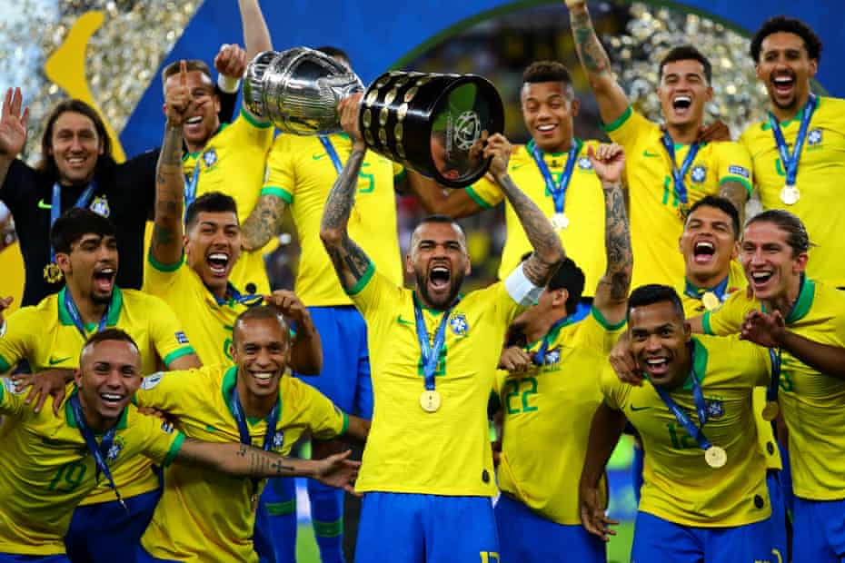 Dani Alves celebrates after winning the Copa América in 2019.