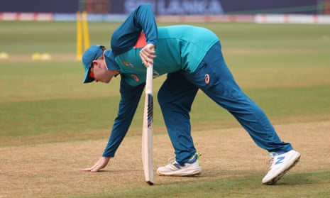 Steve Smith inspects the Lucknow pitch.