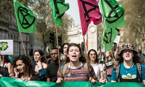 Extinction Rebellion protesters heading to Parliament Square in London on 18 April.