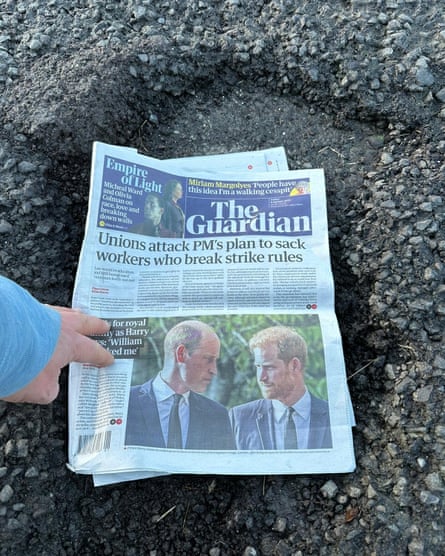Adrian Chiles’ pothole, with the Guardian for scale.