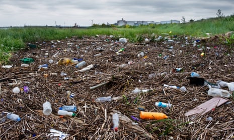 Plastic bottles dominate the litter washed up on the foreshore of the Thames at Rainham on the outskirts of east London.