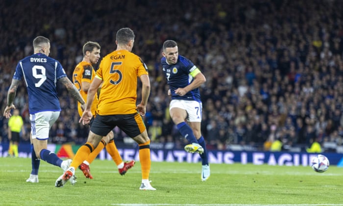 Scotland's John McGinn shoots wide.